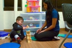 Toddler playing with blocks